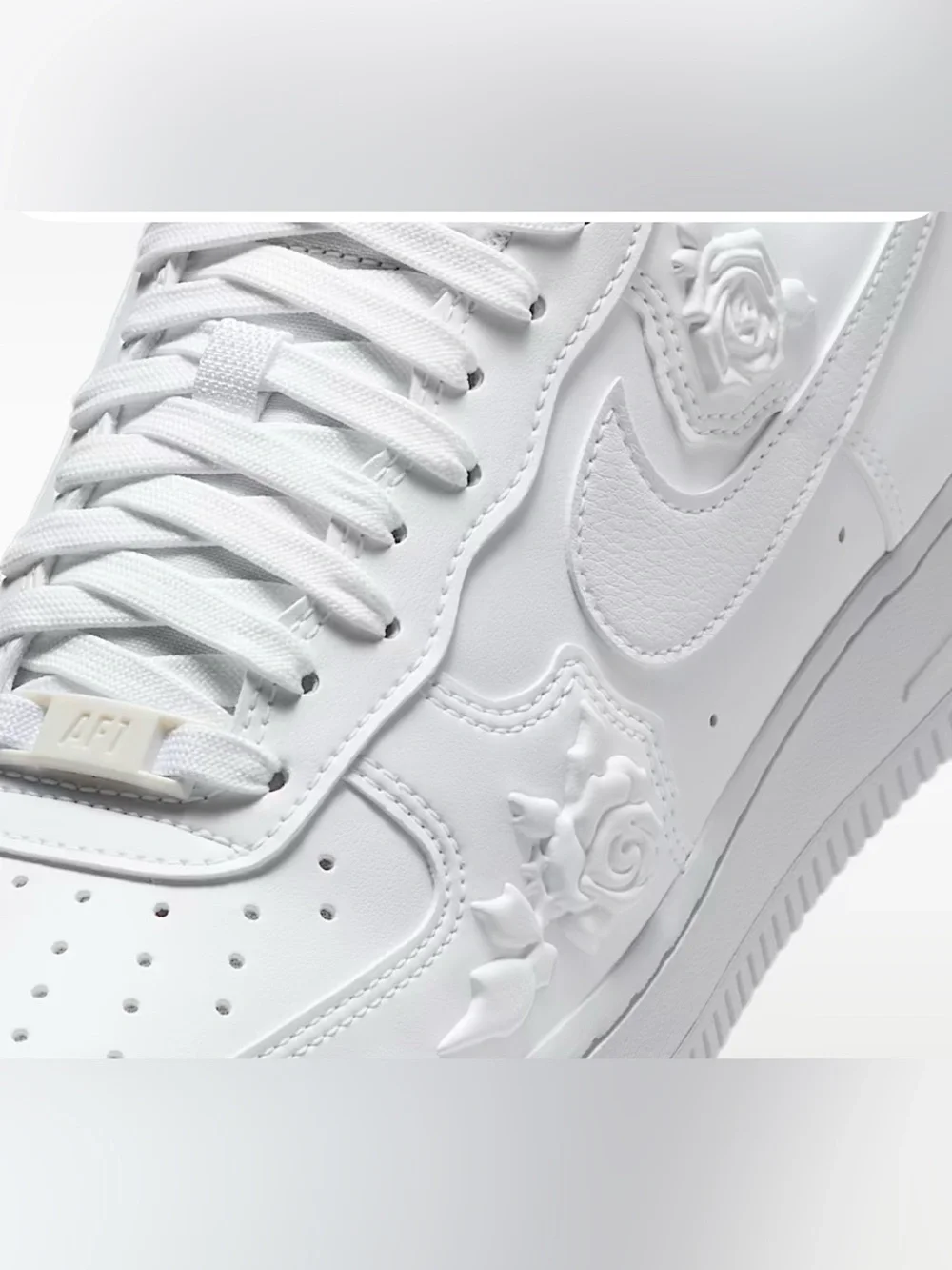 Nike Women’s White Embossed Rose Air Force 1 Sneakers